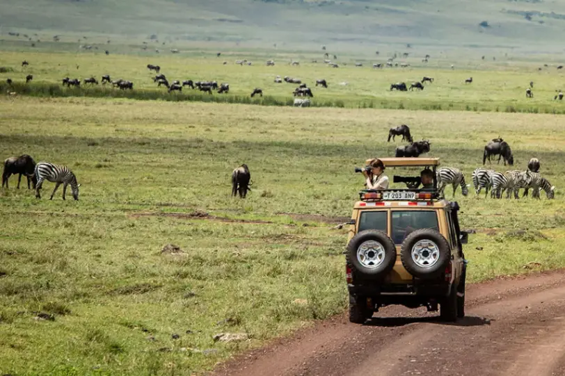 Guests enjoying a day excursion from Gibb’s Farm to the Ngorongoro Crater in Tanzania.