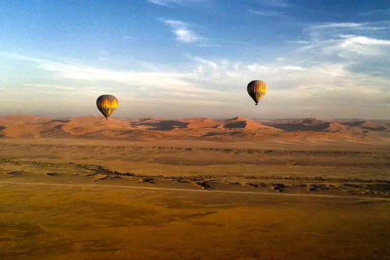Hot air balloon flight over the red sand dunes near Sossusvlei Lodge in the Namib Desert