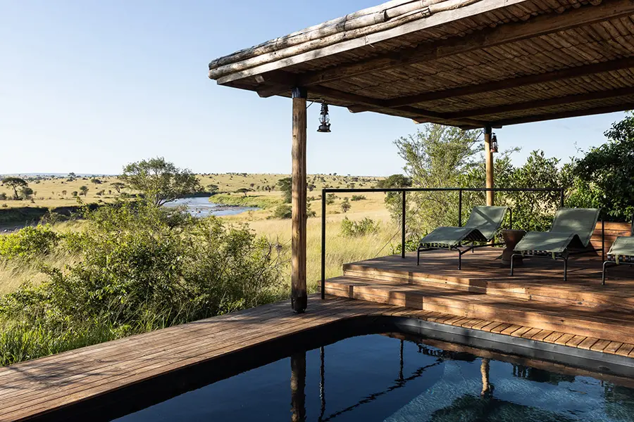 Swimming pool overlooking the Mara River at Singita Mara River Tented Camp in Tanzania