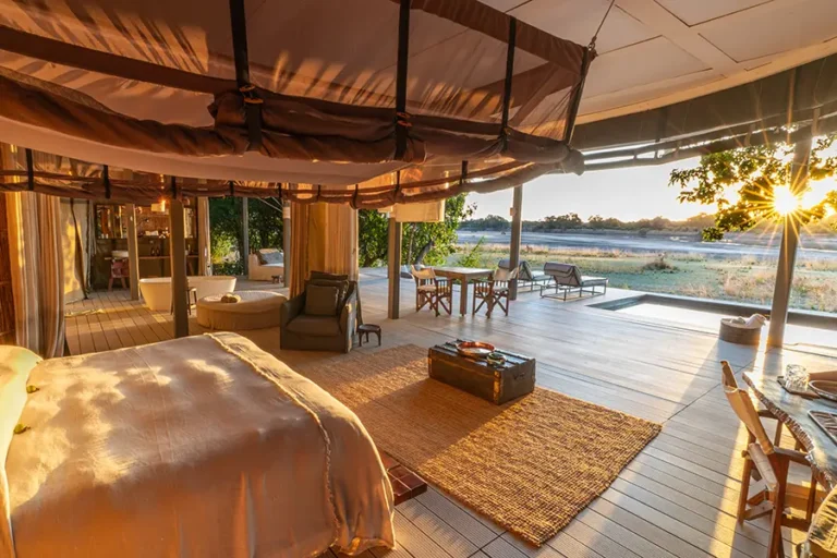 Spacious luxury bedroom inside Chinzombo villa in South Luangwa
