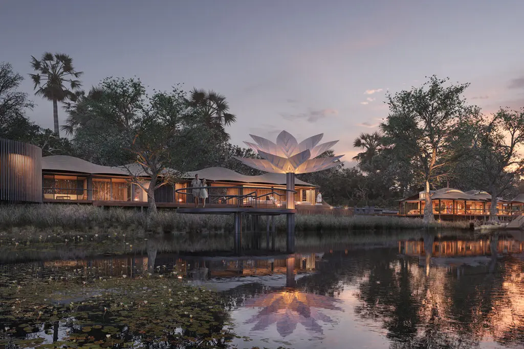 Front view of Xigera Safari Lodge in Botswana's Okavango Delta surrounded by lush vegetation and luxury safari architecture.